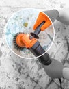 The builder holds in hands Angle grinder. Repair work, interior decoration of walls Royalty Free Stock Photo