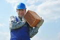 Builder with hollow brick Royalty Free Stock Photo