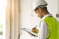 inspection consultancy. Inspector checking material and structure in construction