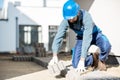 Builder laying paving tiles Royalty Free Stock Photo