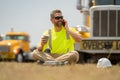 Builder with lunch box and cup of coffee rest. Portrait worker in construction helmet. Engineer builder foreman or Royalty Free Stock Photo