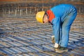 Builder making reinforcement for concrete Royalty Free Stock Photo