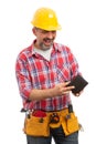 Builder making surprised expression as checking wallet