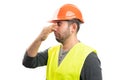 Builder man making grossed expression holding nose as bad smell