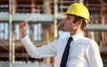Builder manager with a magic wand Royalty Free Stock Photo