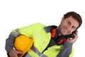 Builder on mobile phone Royalty Free Stock Photo