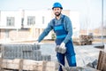 Builder with paving blocks outdoors Royalty Free Stock Photo