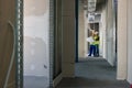 Builder with plan inspecting the construction site Royalty Free Stock Photo