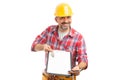 Builder pointing with pen on clipboard holding house keys Royalty Free Stock Photo