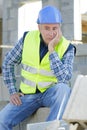 builder in protective helmet shocked about something Royalty Free Stock Photo