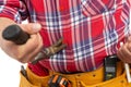 Builder pulling button with claw-hammer