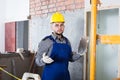 Builder ready is plastering the wall