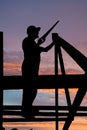 Builder at roofing works Royalty Free Stock Photo