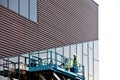 Builder on a Scissor Lift Platform at a constructi