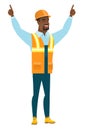 Builder standing with raised arms up.