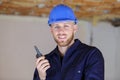 builder talking in walkie-talkie Royalty Free Stock Photo
