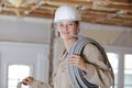 builder woman with cables Royalty Free Stock Photo
