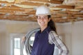 Builder woman holding cables Royalty Free Stock Photo