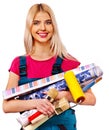 Builder woman with wallpaper. Royalty Free Stock Photo
