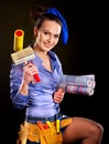 Builder woman witn wallpaper. Royalty Free Stock Photo