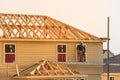 Builder on Wooden House Royalty Free Stock Photo