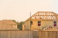 Builder on Wooden House