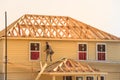 Builder on Wooden House