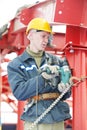 Builder worker assembling metal construction Royalty Free Stock Photo
