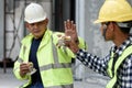 Builder worker eats at construction site Royalty Free Stock Photo