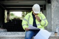 Builder worker eats at construction site Royalty Free Stock Photo