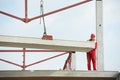 Builder worker installing concrete slab