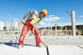 Builder worker installing concrete slab Royalty Free Stock Photo