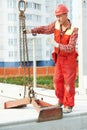 Builder worker installing concrete slab Royalty Free Stock Photo