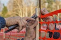 Builder worker Installing Construction Safety Fence 2