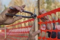 Builder worker Installing Construction Safety Fence 3 Royalty Free Stock Photo