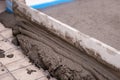 Builder worker plastering concrete at floor of house construction Royalty Free Stock Photo