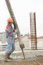 Builder worker pouring concrete Royalty Free Stock Photo