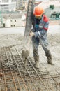 Builder worker pouring concrete Royalty Free Stock Photo