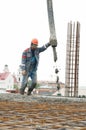 Builder worker pouring concrete Royalty Free Stock Photo