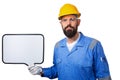 Builder worker in protective construction in yellow helmet holding white board with copyspace, isolated on white background Royalty Free Stock Photo