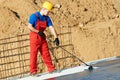 Builder worker at roof insulation work