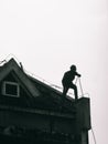 Builder or worker working on the roof