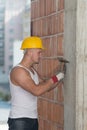 Builder Working With Hammer And Nail Royalty Free Stock Photo