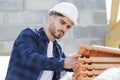 builder working on roof new building Royalty Free Stock Photo