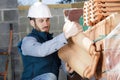 builder working on roof new building Royalty Free Stock Photo