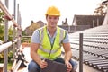 Builder Working On Roof Of New Building Royalty Free Stock Photo