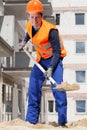 Builder working with a spade