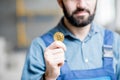 Builder with cryptocoin Royalty Free Stock Photo