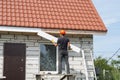 Builder works on the roof Royalty Free Stock Photo