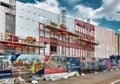 Builders and fitters erecting a pavilion building at the Exhibition of Economic Achievements, construction site, occupations